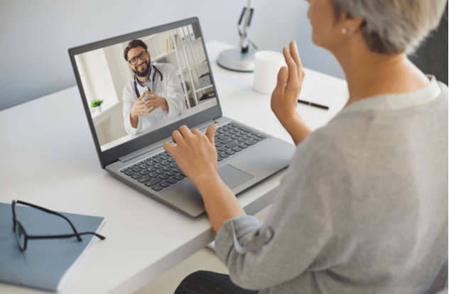 lady talking to doctor online from home.