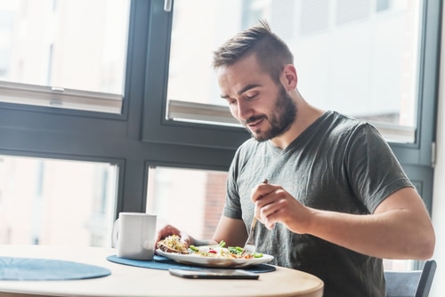 A man eating a healthy morning meal